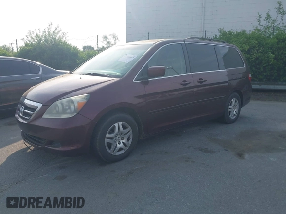 2007 Honda Odyssey EX-L with VIN 5FNRL387X7B140635, listed as a IAAI auction lot 42036807 with 292,774 mi miles. Bid and sale history available at carsss.com. Image 2.