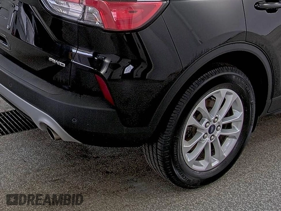 2021 Ford Escape SE with VIN 1FMCU9G64MUA42925, listed as a IAAI auction lot 42858756 with 79,685 mi miles and . Bid and sale history available at DreamBid. Image 13.