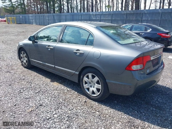 2010 Honda Civic Sdn LX with VIN 2HGFA1F51AH304467, listed as a IAAI auction lot 42042593 with 200,100 mi miles. Bid and sale history available at carsss.com. Image 3.