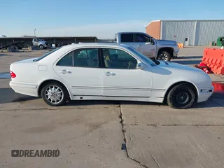 2001 Mercedes-Benz E-Class with VIN WDBJF65J91B249540, listed as a IAAI auction lot 41130248 with 107,582 mi miles. Bid and sale history available at carsss.com. Image 13.