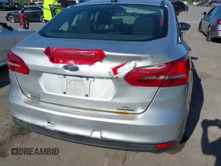 2016 Ford Focus SE with VIN 1FADP3F28GL389377, listed as a IAAI auction lot 42135996 with 172,278 mi miles. Bid and sale history available at carsss.com. Image 6.