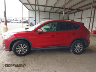 2016 Mazda CX-5 Touring with VIN JM3KE2CY0G0691927, listed as a IAAI auction lot 41611743 with 160,246 mi miles. Bid and sale history available at carsss.com. Image 14.