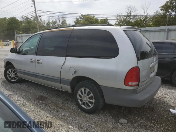 2000 Chrysler Voyager SE z VIN 1C4GJ44G5YB803736, wystawiony jako Copart lot #69868004 z przebiegiem 94 549 mil mil oraz Czysty tytuł • Clean title. Historia ofert i sprzedaży dostępna na DreamBid. Obrazek 2.