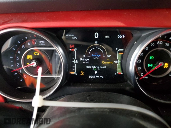 2020 Jeep Gladiator Rubicon z VIN 1C6JJTBG4LL102523, wystawiony jako Copart lot #54735955 z przebiegiem 104 579 mil mil oraz Szkoda całkowita • Salvage title. Historia ofert i sprzedaży dostępna na DreamBid. Obrazek 9.