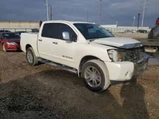 2014 Nissan Titan S with VIN 1N6AA0EC7EN503648, listed as a Copart auction lot 86517824 with 82,556 mi miles and Salvage Title. Bid and sale history available at DreamBid. Image 4.