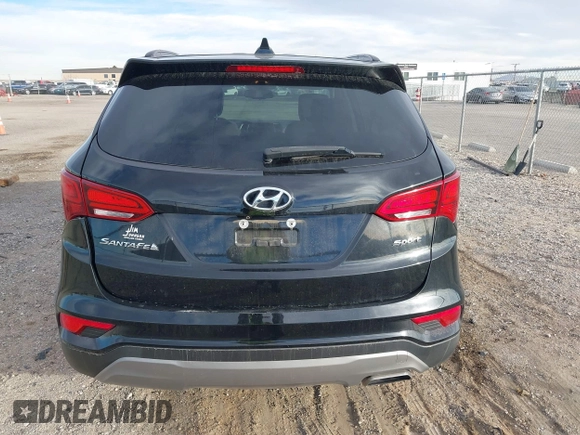 2017 Hyundai Santa Fe 2.4L z VIN 5XYZU3LB5HG425830, wystawiony jako IAAI lot #41428863 z przebiegiem 76 366 mil mil oraz . Historia ofert i sprzedaży dostępna na DreamBid. Obrazek 16.