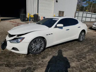 2016 Maserati Ghibli z VIN ZAM57XSAXG1167773, wystawiony jako Copart lot #46607705 z przebiegiem 62 421 mil mil oraz Szkody całkowita. Historia ofert i sprzedaży dostępna na DreamBid. Obrazek 1.