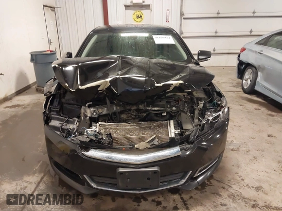 2018 Chevrolet Impala LT with VIN 2G1105S3XJ9109557, listed as a IAAI auction lot 41830451 with 223,577 mi miles and . Bid and sale history available at DreamBid. Image 13.