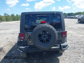 2017 Jeep Wrangler Unlimited Sahara with VIN 1C4BJWEG4HL605213, listed as a IAAI auction lot 42247221 with 104,542 mi miles and . Bid and sale history available at DreamBid. Image 16.