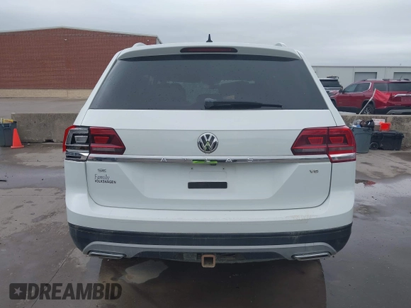 2019 Volkswagen Atlas SE z VIN 1V2WR2CA9KC593891, wystawiony jako IAAI lot #41947078 z przebiegiem 74 525 mil mil oraz . Historia ofert i sprzedaży dostępna na DreamBid. Obrazek 17.