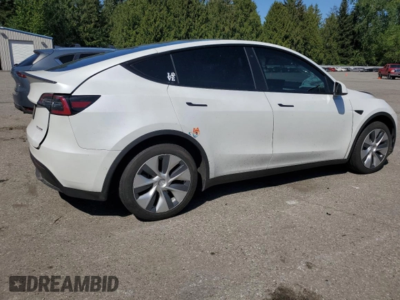 2020 Tesla Model Y Long Range with VIN 5YJYGDEF9LF023060, listed as a Copart auction lot 55462395 with 58,211 mi miles and Salvage Title. Bid and sale history available at DreamBid. Image 3.