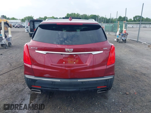 2018 Cadillac XT5 Premium Luxury FWD z VIN 1GYKNERS2JZ242842, wystawiony jako IAAI lot #42297159 z przebiegiem 72 008 mil mil oraz . Historia ofert i sprzedaży dostępna na DreamBid. Obrazek 16.
