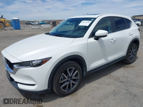 2018 Mazda CX-5 Touring with VIN JM3KFACM3J0381122, listed as a IAAI auction lot 42023838 with 76,121 mi miles. Bid and sale history available at carsss.com. Image 17.