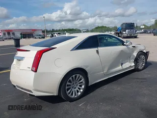 2014 Cadillac CTS Performance with VIN 1G6DC1E39E0132332, listed as a IAAI auction lot 42485811 with 109,899 mi miles and . Bid and sale history available at DreamBid. Image 4.