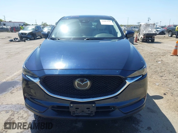 2018 Mazda CX-5 Grand Touring с VIN JM3KFBDM6J0326684, выставлен на аукционе IAAI как лот 42087646 с пробегом 111 192 миль миль и . История ставок и продаж доступна на DreamBid. Изображение 12.
