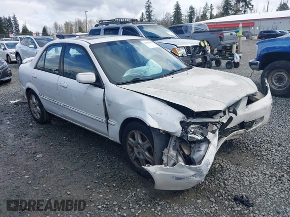 2002 Mazda Protege DX with VIN JM1BJ225520542854, listed as a IAAI auction lot 41955679 with 161,338 mi miles and . Bid and sale history available at DreamBid. Image 1.