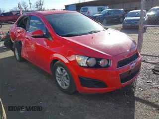 2013 Chevrolet Sonic LT with VIN 1G1JC5SHXD4120536, listed as a IAAI auction lot 41704974 with 124,459 mi miles and . Bid and sale history available at DreamBid. Image 1.
