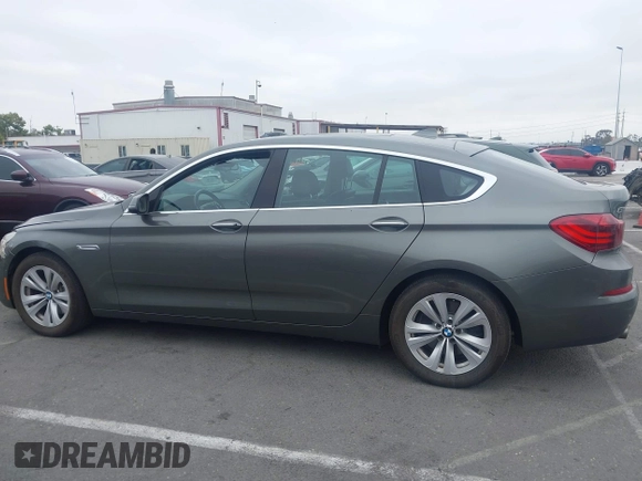 2015 BMW 5 Series 535i Gran Turismo z VIN WBA5M2C5XFD872228, wystawiony jako IAAI lot #42737501 z przebiegiem 71 027 mil mil oraz . Historia ofert i sprzedaży dostępna na DreamBid. Obrazek 14.