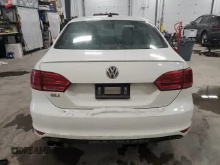 2014 Volkswagen Jetta GLI Edition 30 z VIN 3VW4S7AJ9EM277971, wystawiony jako Copart lot #88305645 z przebiegiem 167 931 mil mil oraz Szkoda całkowita • Salvage title. Historia ofert i sprzedaży dostępna na DreamBid. Obrazek 6.