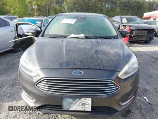 2016 Ford Focus Titanium with VIN 1FADP3J25GL282293, listed as a IAAI auction lot 41998959 with 119,781 mi miles and . Bid and sale history available at DreamBid. Image 12.