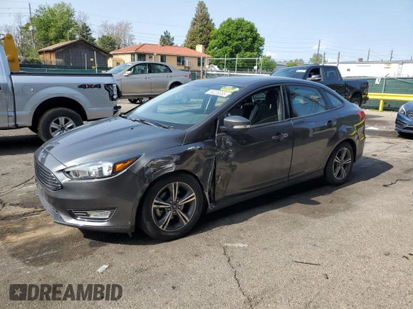 2016 Ford Focus SE z VIN 1FADP3FE7GL238752, wystawiony jako Copart lot #59226335 z przebiegiem 46 289 mil mil oraz Czysty tytuł • Clean title. Historia ofert i sprzedaży dostępna na DreamBid. Obrazek 1.