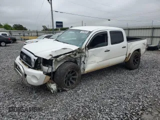 2011 Toyota Tacoma PreRunner with VIN 3TMJU4GN5BM113539, listed as a Copart auction lot 52208635 with 304,559 mi miles and Salvage Title. Bid and sale history available at DreamBid. Image 1.