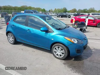 2012 Mazda 2 Sport z VIN JM1DE1KY5C0149990, wystawiony jako IAAI lot #42177069 z przebiegiem 85 371 mil mil oraz . Historia ofert i sprzedaży dostępna na DreamBid. Obrazek 1.
