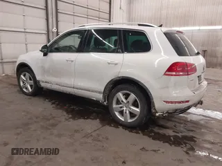 2013 Volkswagen Touareg Lux with VIN WVGEF9BP5DD011511, listed as a IAAI auction lot 41608840 with 167,350 mi miles and . Bid and sale history available at DreamBid. Image 3.
