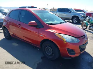 2014 Mazda 2 Sport with VIN JM1DE1KZ5E0172309, listed as a IAAI auction lot 41811709 with 111,622 mi miles. Bid and sale history available at carsss.com. Image 1.