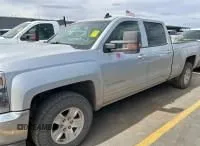 2017 Chevrolet Silverado 1500 LT with VIN 3GCUKREC5HG461933, listed as a IAAI auction lot 41962691 with 148,279 mi miles and . Bid and sale history available at DreamBid. Image 1.