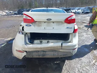 2014 Ford Fiesta S z VIN 3FADP4AJ4EM125475, wystawiony jako IAAI lot #41697578 z przebiegiem 160 189 mil mil oraz . Historia ofert i sprzedaży dostępna na DreamBid. Obrazek 16.