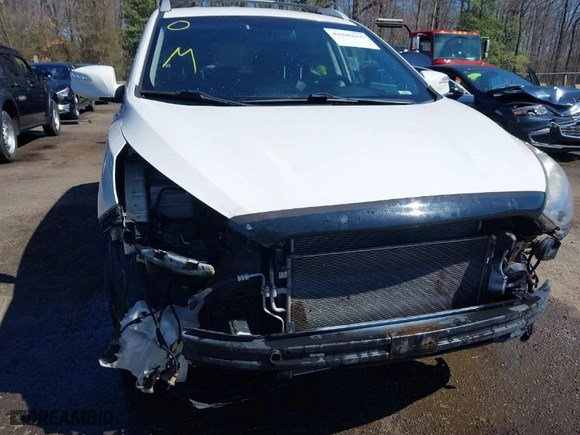 2013 Hyundai Tucson GLS with VIN KM8JU3AC6DU646866, listed as a IAAI auction lot 41846665 with 156,779 mi miles. Bid and sale history available at carsss.com. Image 6.