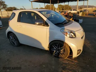 2015 Scion iQ with VIN JTNJJXB09FJ030846, listed as a Copart auction lot 88353405 with 72,208 mi miles and Salvage Title. Bid and sale history available at carsss.com. Image 4.