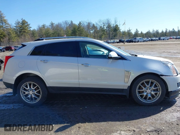 2014 Cadillac SRX Performance Collection with VIN 3GYFNFE30ES586713, listed as a IAAI auction lot 41791356 with 74,927 mi miles and . Bid and sale history available at DreamBid. Image 14.