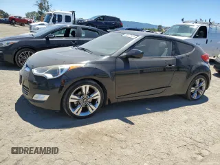 2014 Hyundai Veloster with VIN KMHTC6AD3EU190669, listed as a Copart auction lot 65572535 with 140,752 mi miles and Salvage title. Bid and sale history available at DreamBid. Image 1.