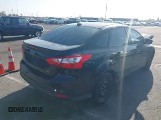 2012 Ford Focus SE with VIN 1FAHP3F26CL236976, listed as a IAAI auction lot 42302561 with 177,476 mi miles and . Bid and sale history available at DreamBid. Image 4.
