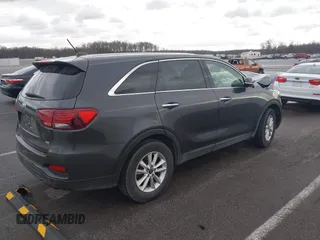 2019 Kia Sorento L with VIN 5XYPG4A32KG510776, listed as a IAAI auction lot 41716252 with 129,725 mi miles and . Bid and sale history available at carsss.com. Image 4.