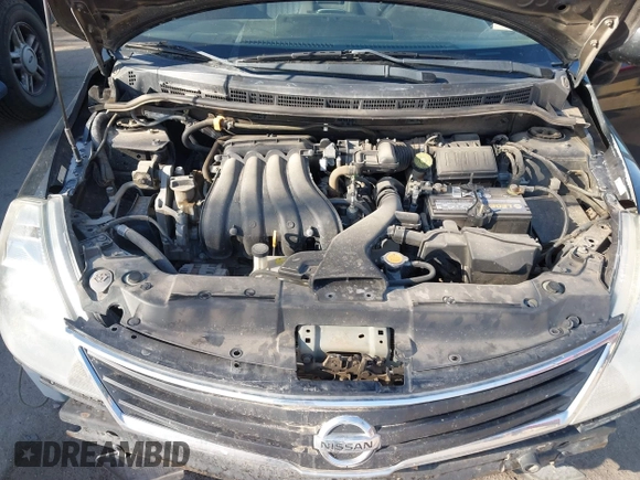 2012 Nissan Versa S with VIN 3N1BC1CP3CL360582, listed as a IAAI auction lot 41773403 with 148,525 mi miles. Bid and sale history available at carsss.com. Image 10.