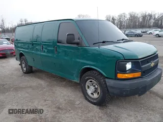 2014 Chevrolet Express Cargo Van with VIN 1GCWGGCAXE1198199, listed as a IAAI auction lot 41242821 with 274,446 mi miles. Bid and sale history available at carsss.com. Image 1.
