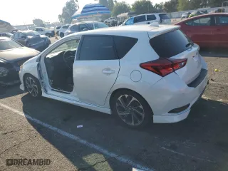 2018 Toyota Corolla iM with VIN JTNKARJE3JJ558579, listed as a Copart auction lot 74321954 with 182,506 mi miles and Salvage Title. Bid and sale history available at carsss.com. Image 2.
