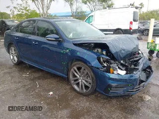 2018 Volkswagen Passat 2.0T S with VIN 1VWAA7A30JC021740, listed as a IAAI auction lot 41887035 with 65,227 mi miles. Bid and sale history available at carsss.com. Image 1.