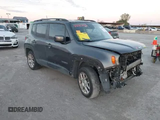 2021 Jeep Renegade Latitude with VIN ZACNJDBB0MPN13884, listed as a IAAI auction lot 40957052 with 52,023 mi miles. Bid and sale history available at carsss.com. Image 1.
