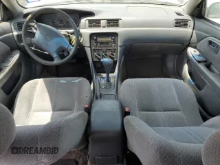 2001 Toyota Camry CE z VIN 4T1BG22K71U837591, wystawiony jako Copart lot #61239094 z przebiegiem 230 941 mil mil oraz Szkoda całkowita • Salvage title. Historia ofert i sprzedaży dostępna na DreamBid. Obrazek 8.