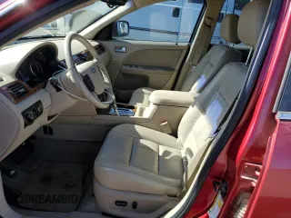 2006 Ford Five Hundred SEL with VIN 1FAFP24126G185999, listed as a Copart auction lot 76127404 with 167,624 mi miles and Salvage Title. Bid and sale history available at carsss.com. Image 7.