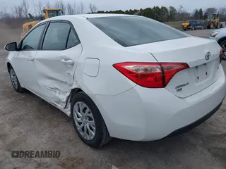 2019 Toyota Corolla L with VIN 5YFBURHE0KP889909, listed as a IAAI auction lot 41888953 with 130,529 mi miles. Bid and sale history available at carsss.com. Image 3.