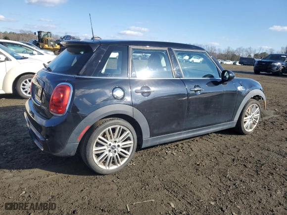 2015 MINI Cooper Hardtop 4 Door S with VIN WMWXU3C57FT892389, listed as a Copart auction lot 44304325 with 91,697 mi miles and Salvage Title. Bid and sale history available at carsss.com. Image 3.