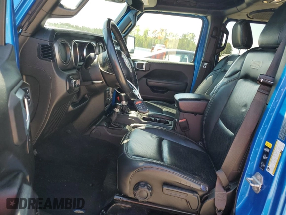 2021 Jeep Wrangler Unlimited Willys with VIN 1C4HJXDM5MW824651, listed as a Copart auction lot 51843605 with 51,647 mi miles and Salvage Title. Bid and sale history available at DreamBid. Image 7.