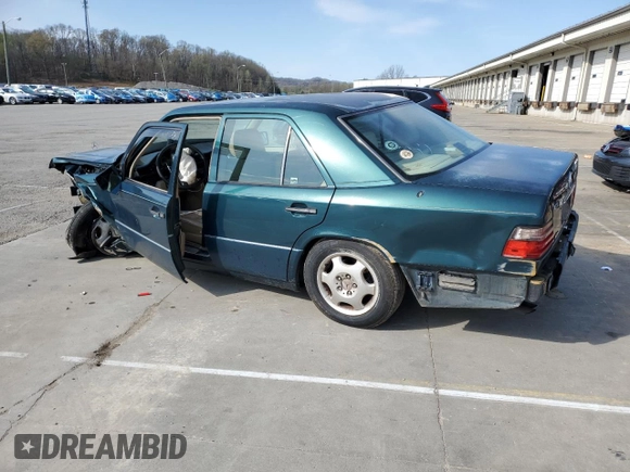 1995 Mercedes-Benz E Class with VIN WDBEA32E1SC242552, listed as a Copart auction lot 52433285 with 211,669 mi miles and Salvage Title. Bid and sale history available at carsss.com. Image 2.
