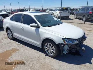 2013 Volkswagen Jetta SE z VIN 3VWDX7AJ4DM424276, wystawiony jako IAAI lot #41878223 z przebiegiem 152 789 mil mil oraz . Historia ofert i sprzedaży dostępna na DreamBid. Obrazek 1.