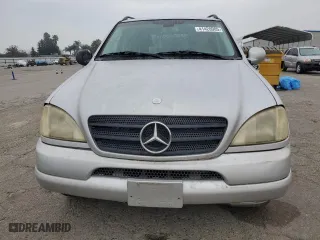 2001 Mercedes-Benz M-Class with VIN 4JGAB54E31A236148, listed as a Copart auction lot 41420905 with 163,120 mi miles and Clean Title. Bid and sale history available at carsss.com. Image 5.